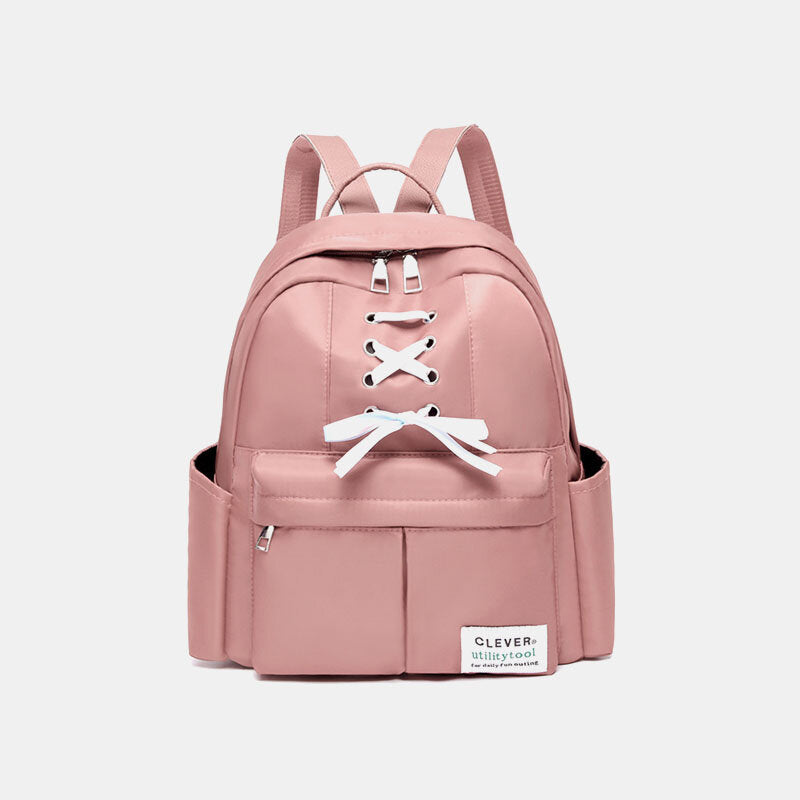 Mochila de nailon para mujer con detalle de lazo: compacta, con varios bolsillos y correas de hombro ajustables