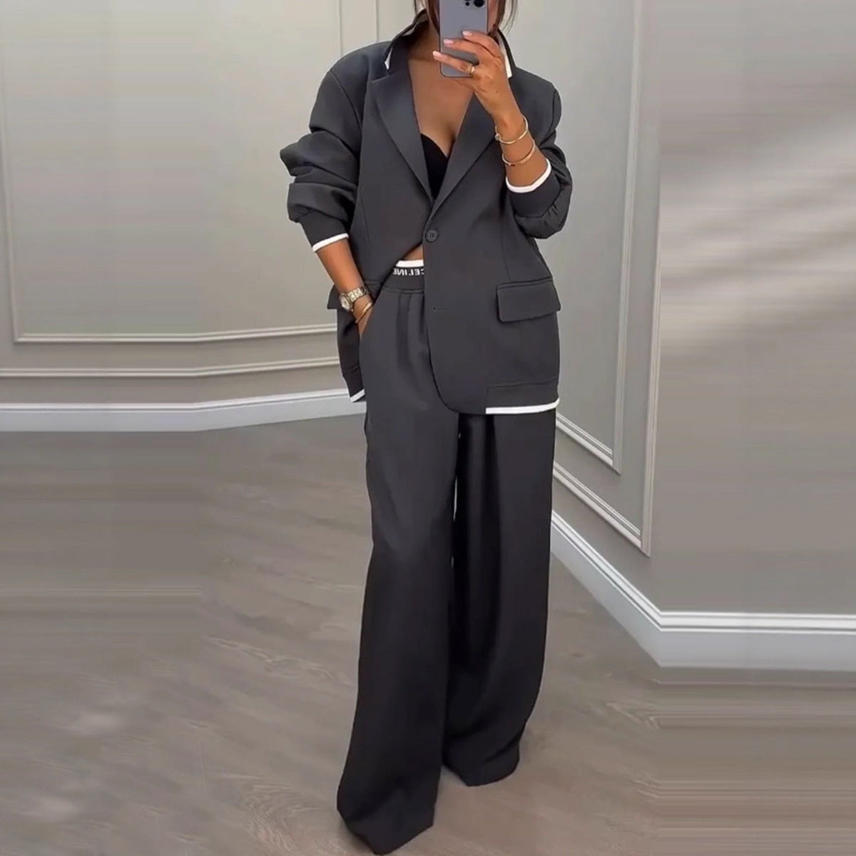 Elegante getailleerde blazer en broekpak voor dames met wijde pijpen - losvallende formele tweedelige outfit voor kantoor en gekleed casual