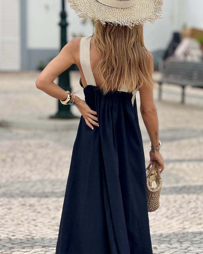 Abito lungo da donna incrociato con scollo all'americana e silhouette fluente