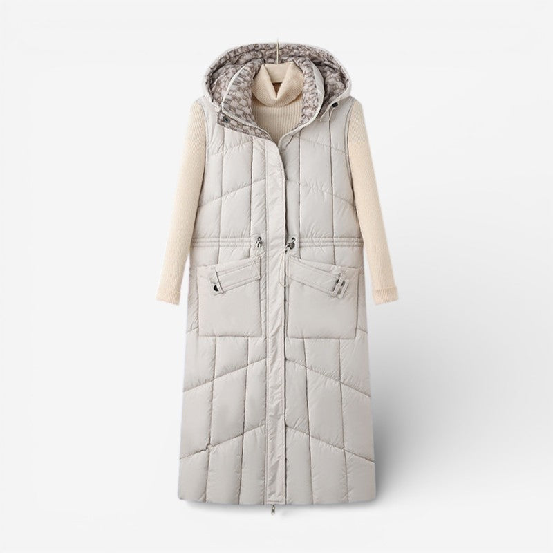 Lang, omkeerbaar gewatteerd damesgilet met capuchon en verstelbare taille - warme mouwloze gewatteerde bodywarmer voor herfst en winter