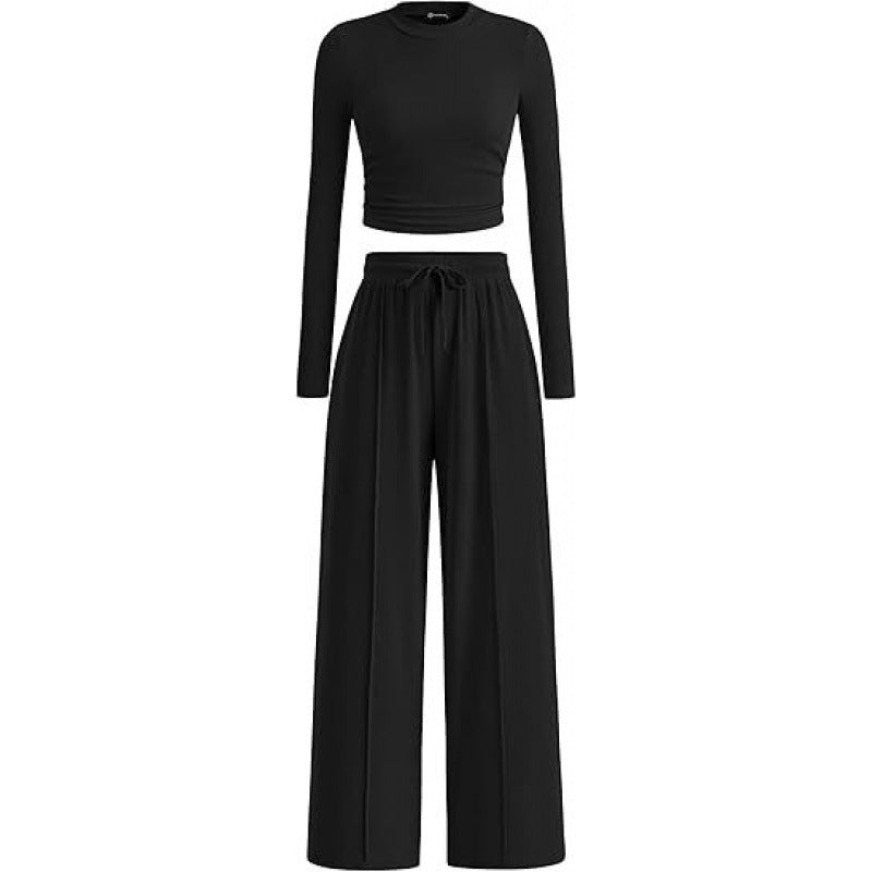 Dámská souprava vypasovaného topu s dlouhými rukávy a kalhot se širokými nohavicemi – minimalistický dvoudílný outfit pro každodenní volnočasové nošení