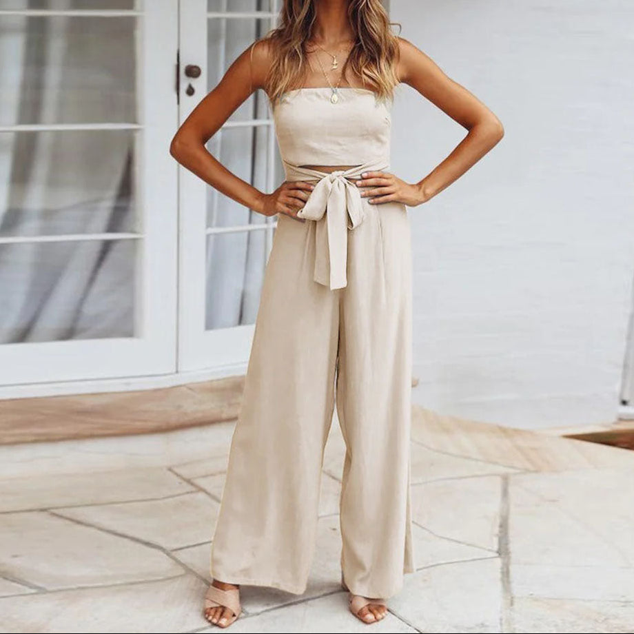Strapless jumpsuit voor dames met wijde pijpen en strikceintuur - outfit met uitsparingen voor zomeravonden