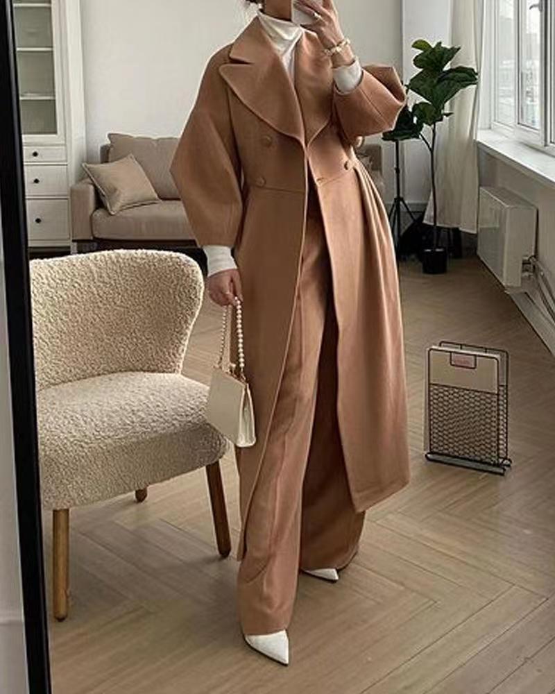 Women's Elegant Long Wool Winter Coat with Double-Breasted Button Front and Wide Notched Lapels – Tailored Fitted Waist Maxi Overcoat with Statement Sleeves for Sophisticated Office Wear and Formal Autumn Winter Styling