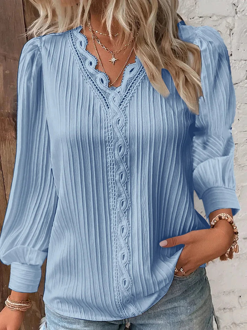 Blusa elegante de mujer con escote en V – Tela estructurada, manga larga, detalle de encaje