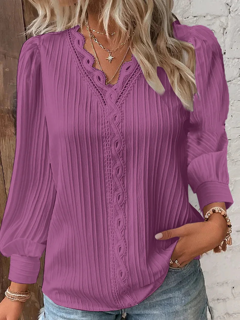 Blusa elegante de mujer con escote en V – Tela estructurada, manga larga, detalle de encaje