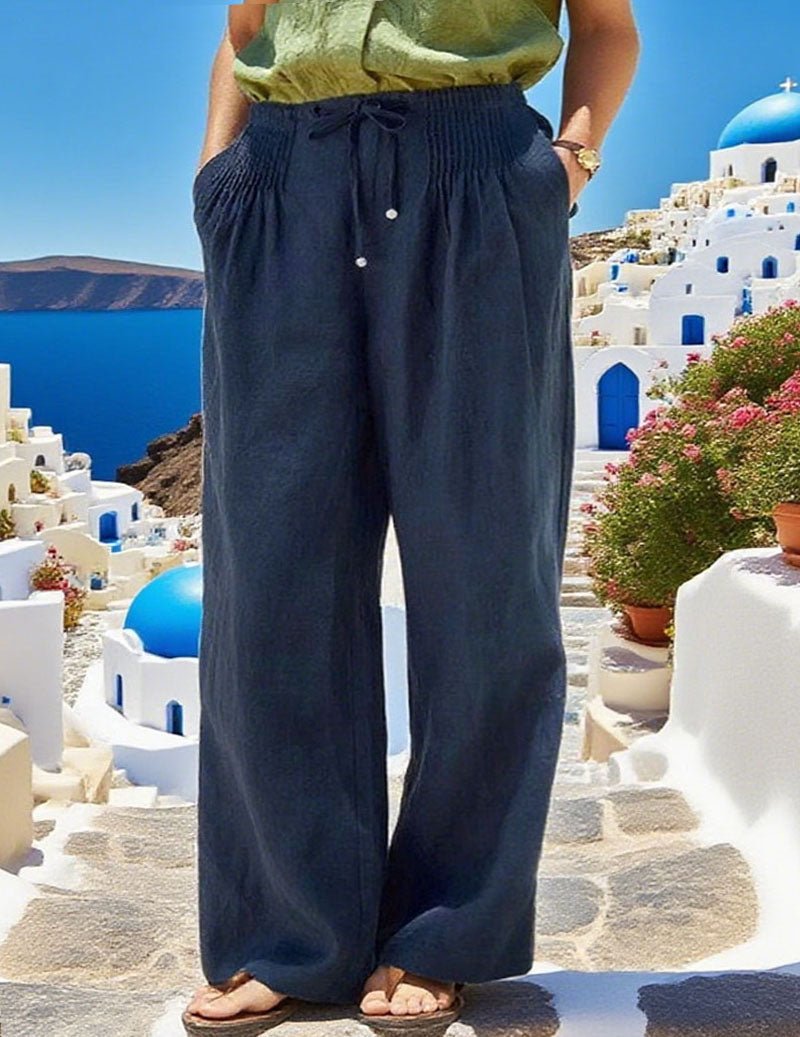 Pantaloni da donna in lino con vita arricciata e gambe larghe