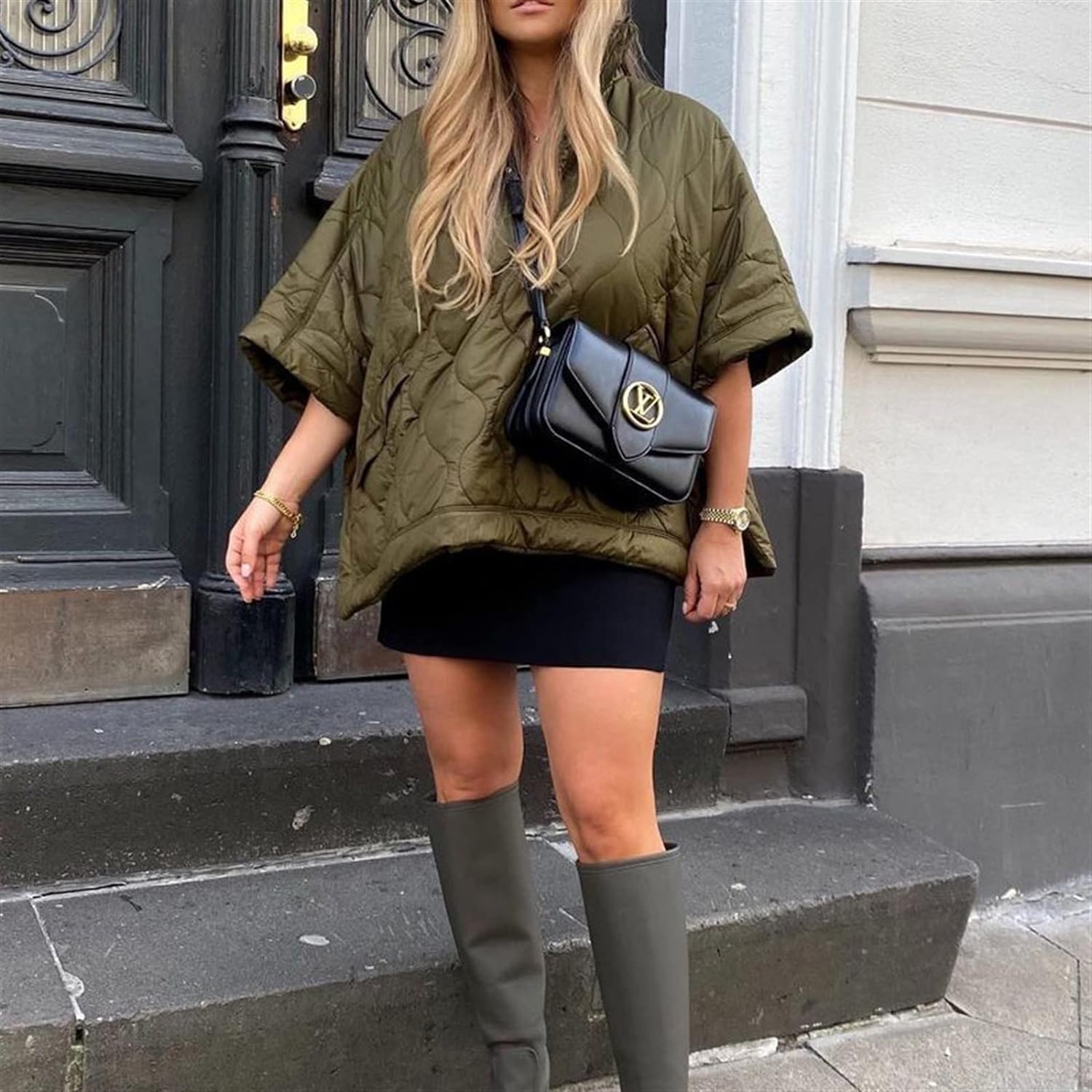 Casaco-capa acolchoado para mulher – poncho quente com gola subida para viagens de inverno e atividades ao ar livre