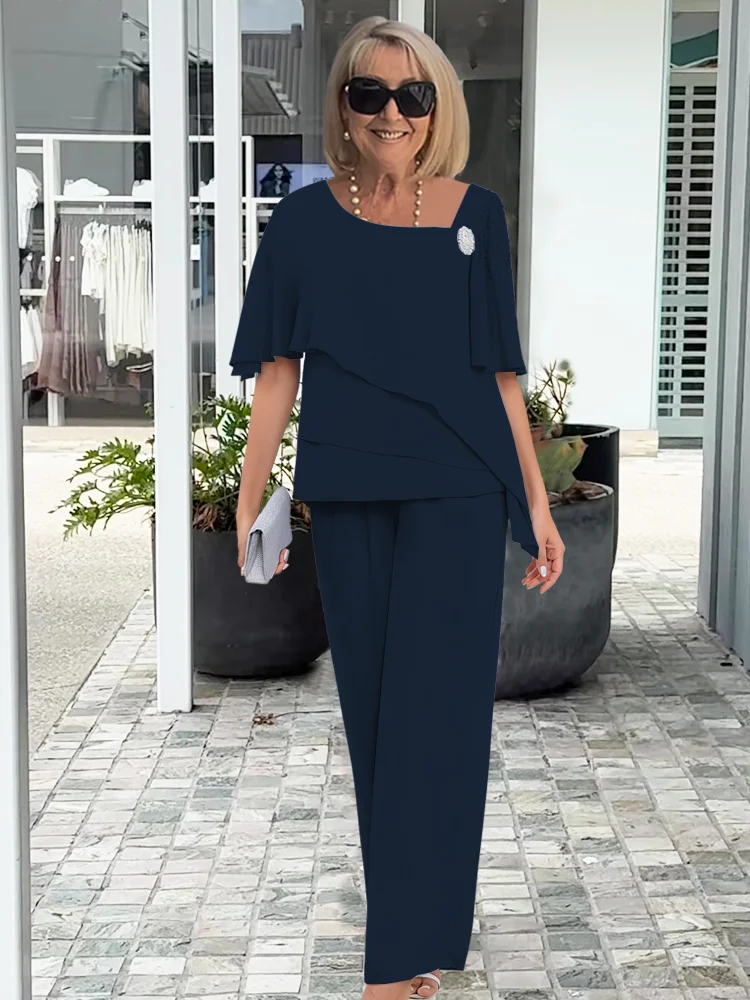 Conjunto feminino de top em camadas e calças de perna larga – visual elegante para a noite