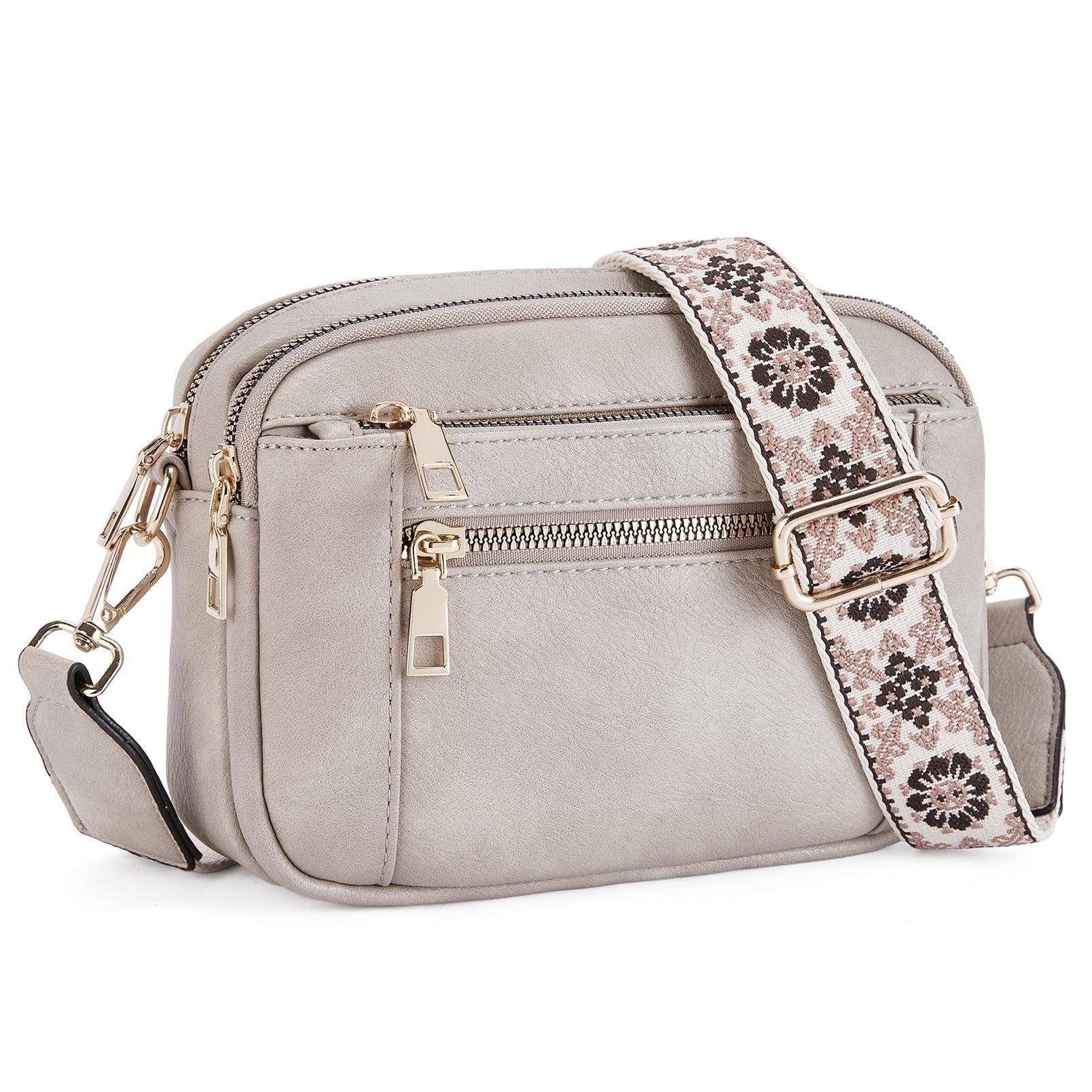 Borsa a tracolla donna con più zip e dettaglio della tracolla stampata