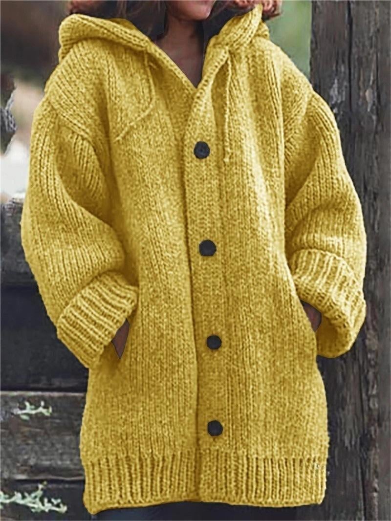 Dámský oversized pletený kardigan s kapucí - objemný dlouhý model na knoflíky s kapsami pro ležérní podzimní a zimní každodenní nošení