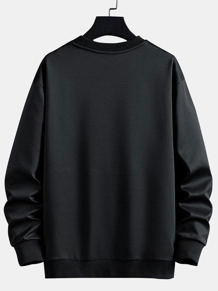 Afslappet sweatshirt til mænd med abstrakte farveblokke, rund hals og buede kontrastpaneler – langærmet fritidstrøje i streetwear-stil til hverdagsbrug
