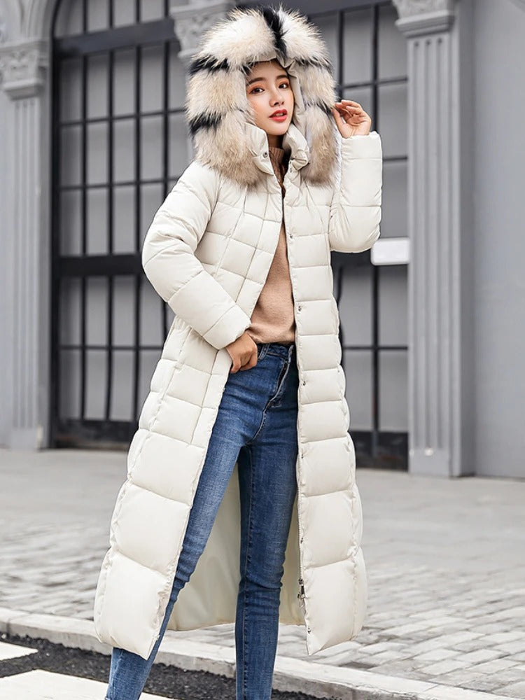 Women’s Fur-Trimmed Long Puffer Winter Coat – Warm Hooded Quilted Layer for Everyday City Wear Winter Travel Outdoor Walks and Elegant Cold-Weather Styling