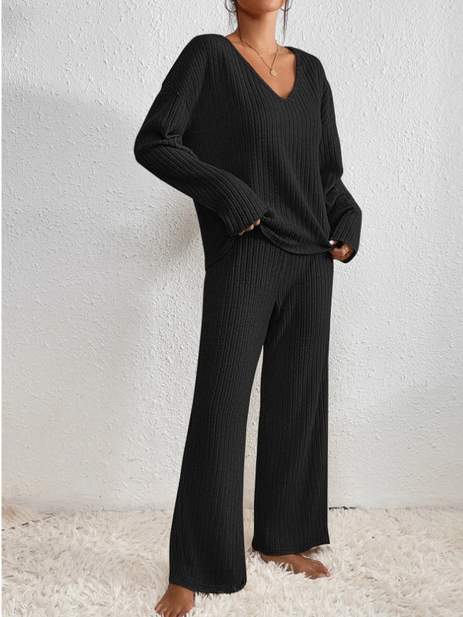 Damen-Zweiteiler aus gerippter Strickware - Lockerer Pullover mit V-Ausschnitt und Hose mit weitem Bein für Herbst und Winter
