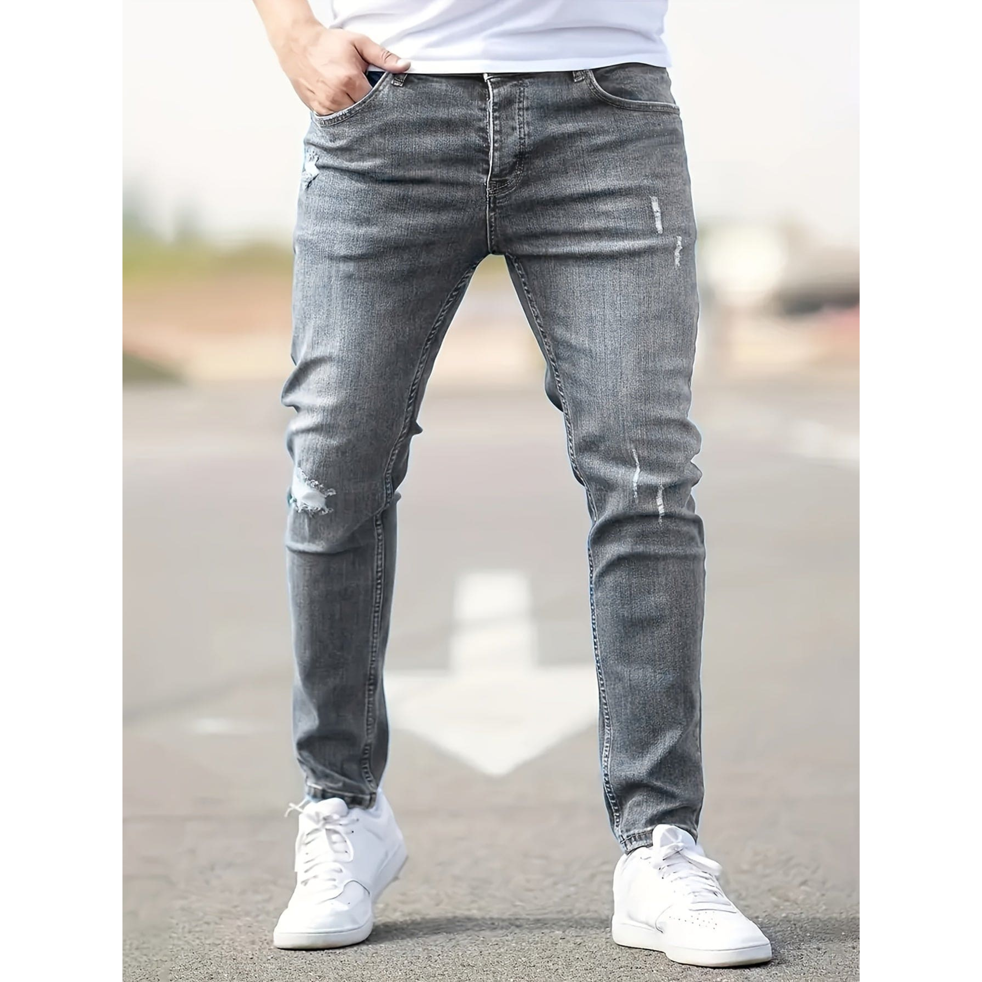 Jeans ajustados para hombre de mezclilla elástica desgastada