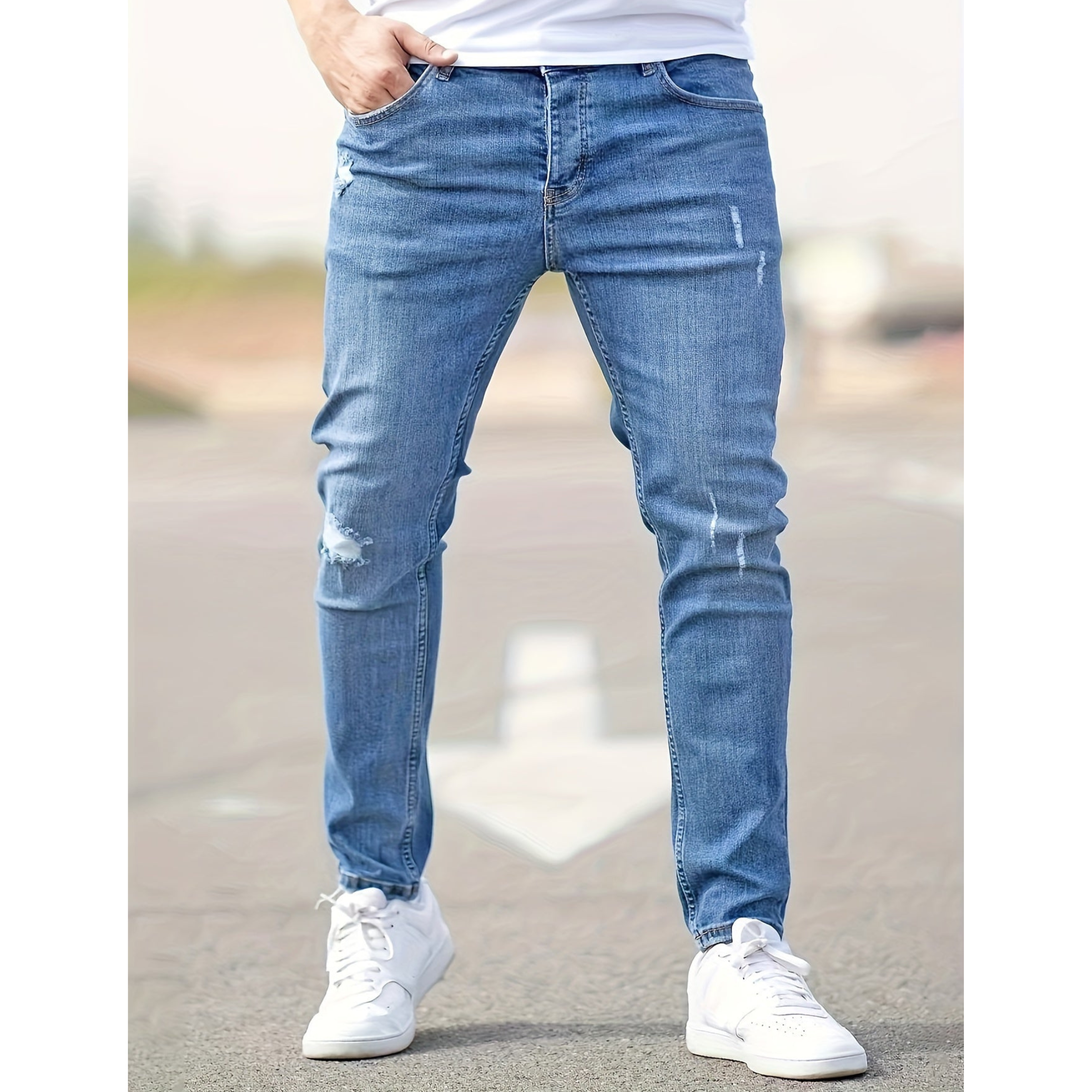 Jeans ajustados para hombre de mezclilla elástica desgastada