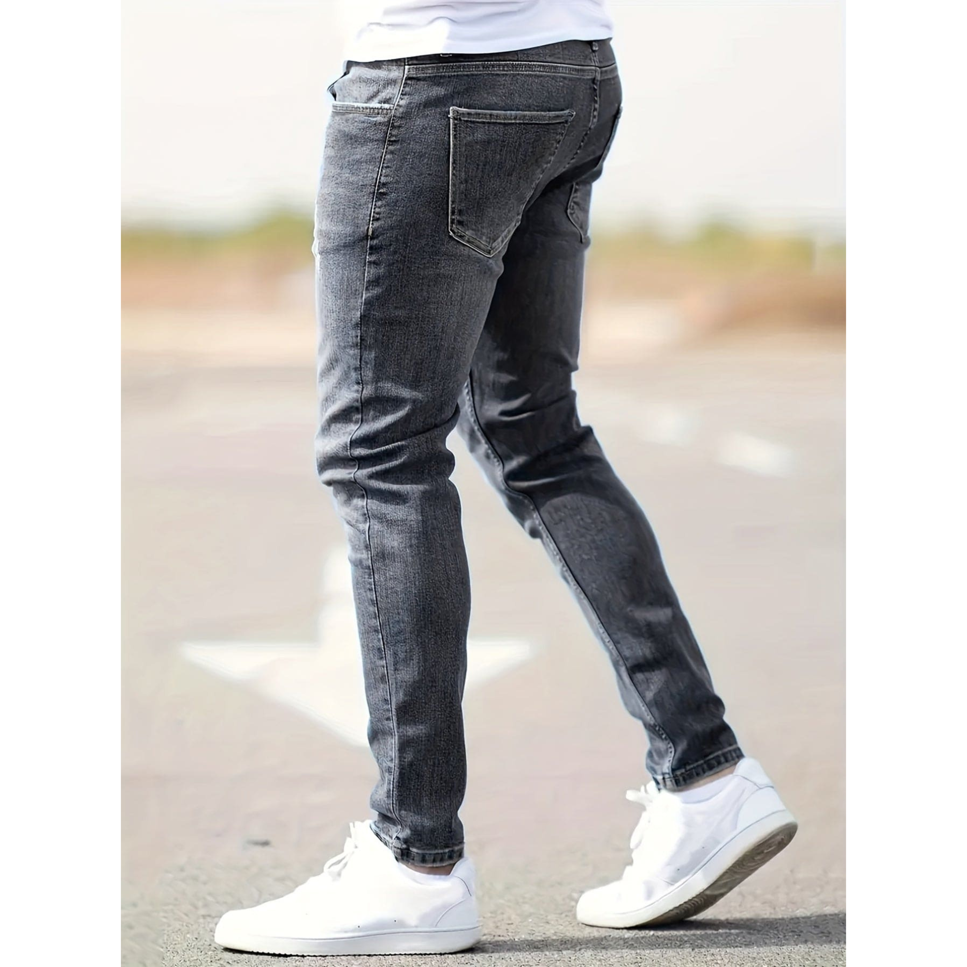 Jeans ajustados para hombre de mezclilla elástica desgastada