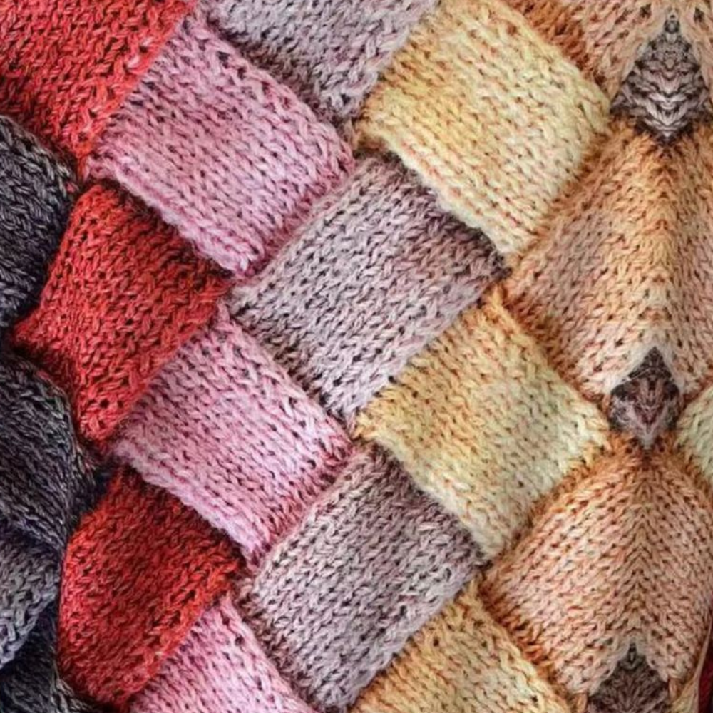 Damski sweter dzianinowy o fakturowanej strukturze, luźnym kroju i długich rękawach