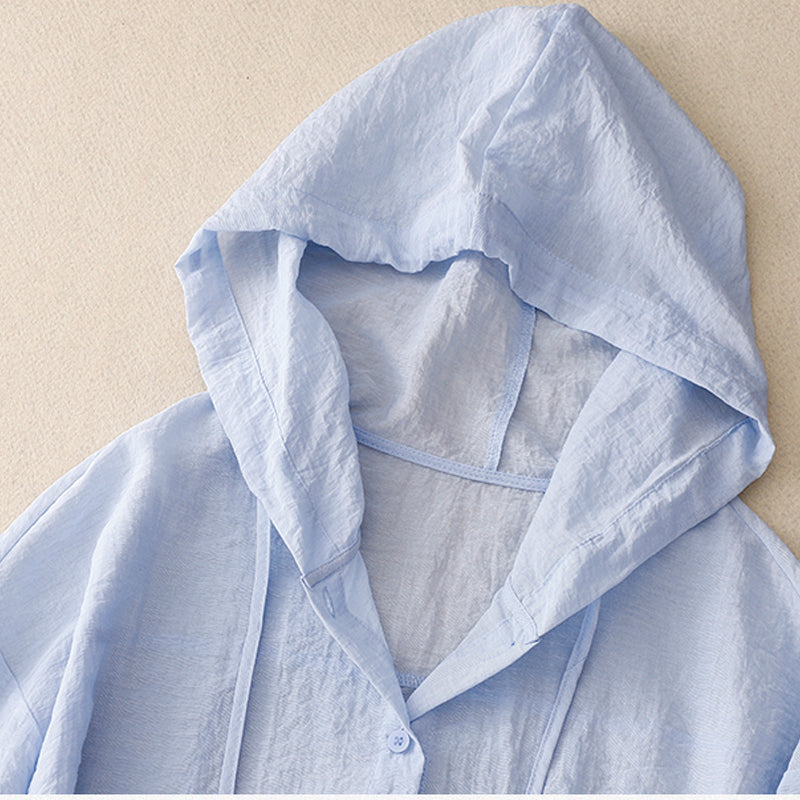 Damebluse med hætte, knapper foran, lange ærmer og afslappet pasform
