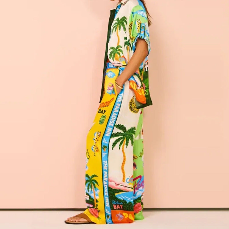 Losvallend overhemd met print en knopen en broekset voor dames met wijde pijpen - lichte tweedelige zomeroutfit van satijnmix voor een resort