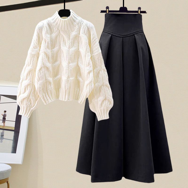 Kabelstrikket trøje og lang plisseret nederdel til kvinder – elegant todelt outfit med høj halsudskæring og lange ærmer til køligere dage