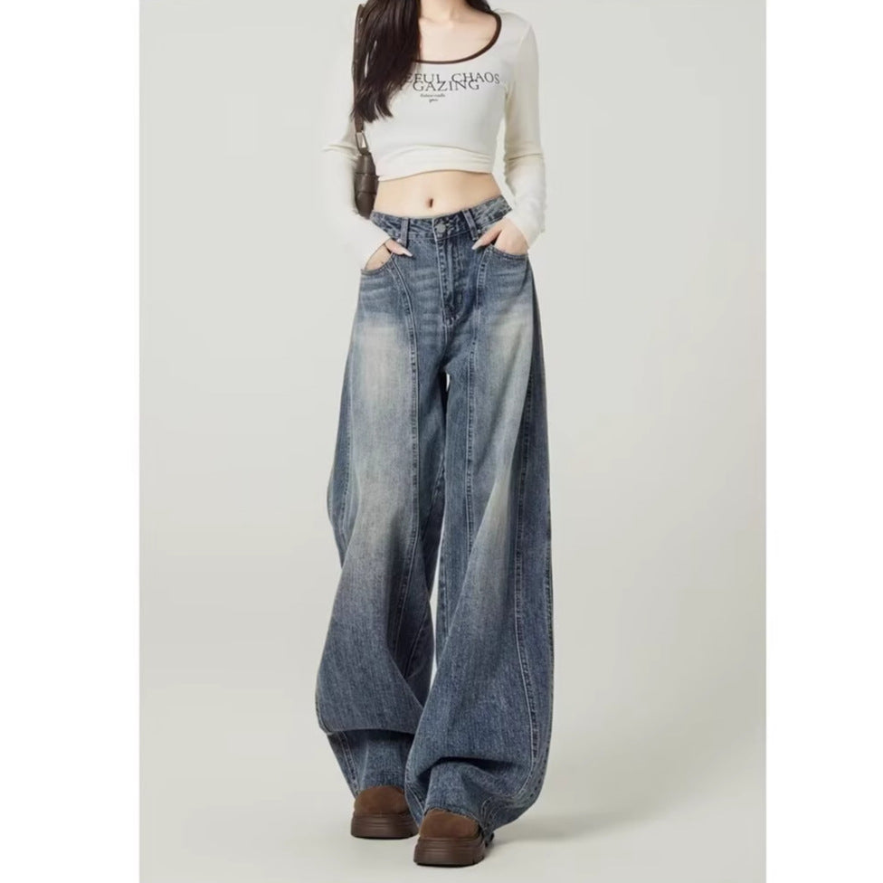 Damejeans med høj talje, vasket, brede ben og tøndeformet denim