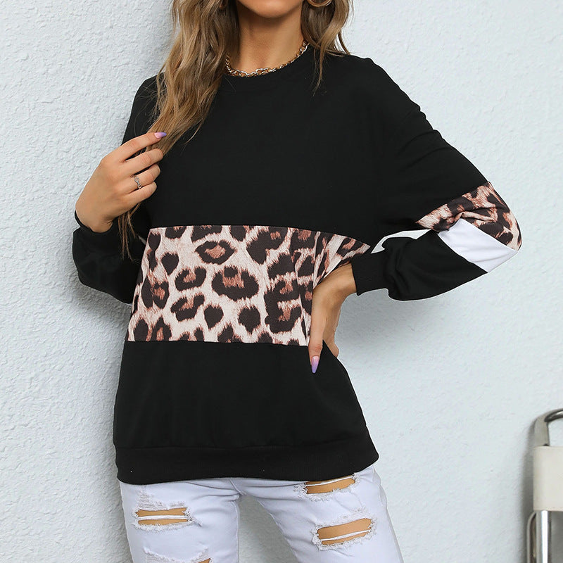 Dames sweatshirt med leopardpanel – Afslappet pullover med rund hals og markante ærmer