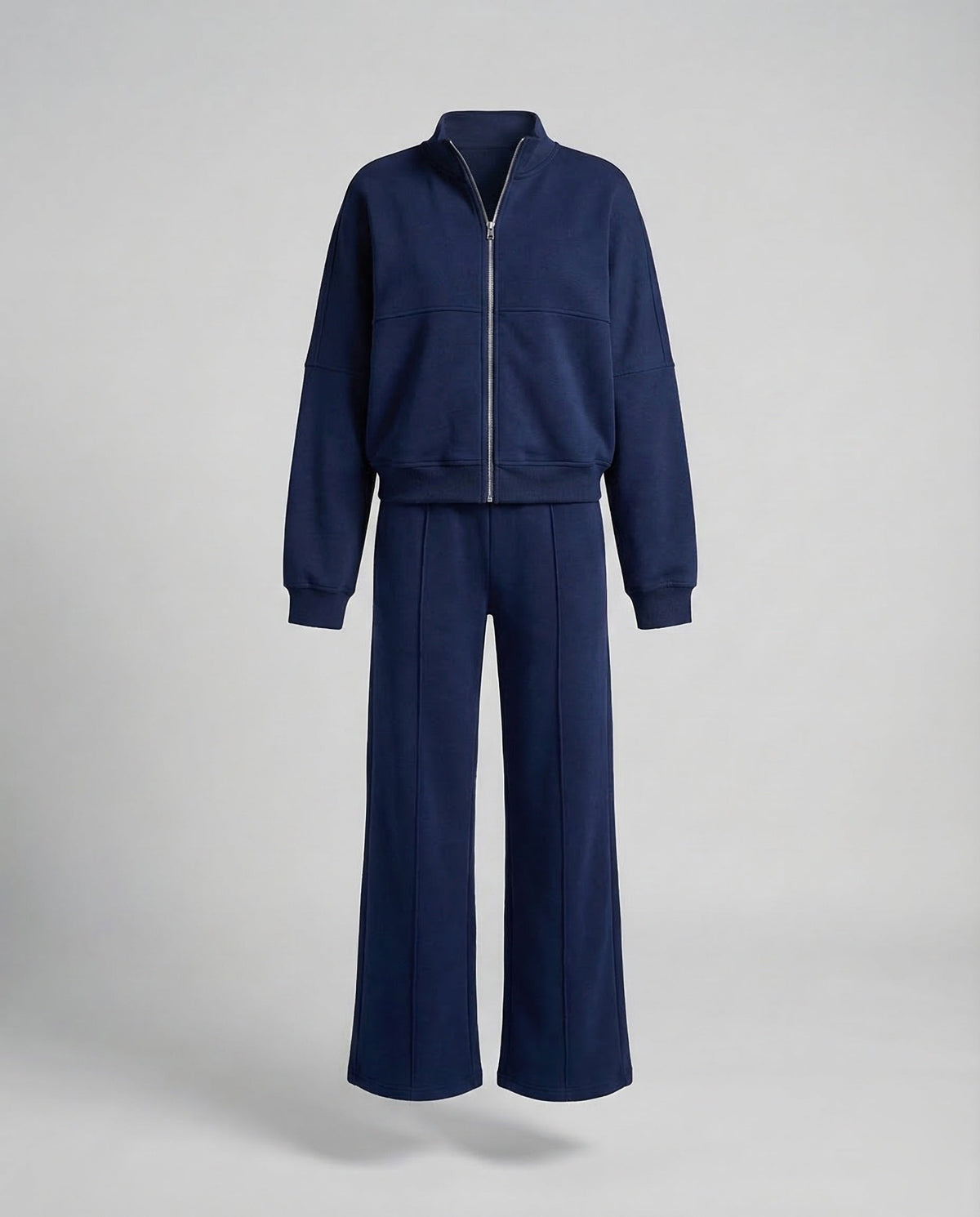 Completo sportivo da donna a due pezzi con giacca corta con zip e pantaloni ampi – Outfit coordinato dal taglio morbido, ideale per viaggi e momenti di relax nel weekend