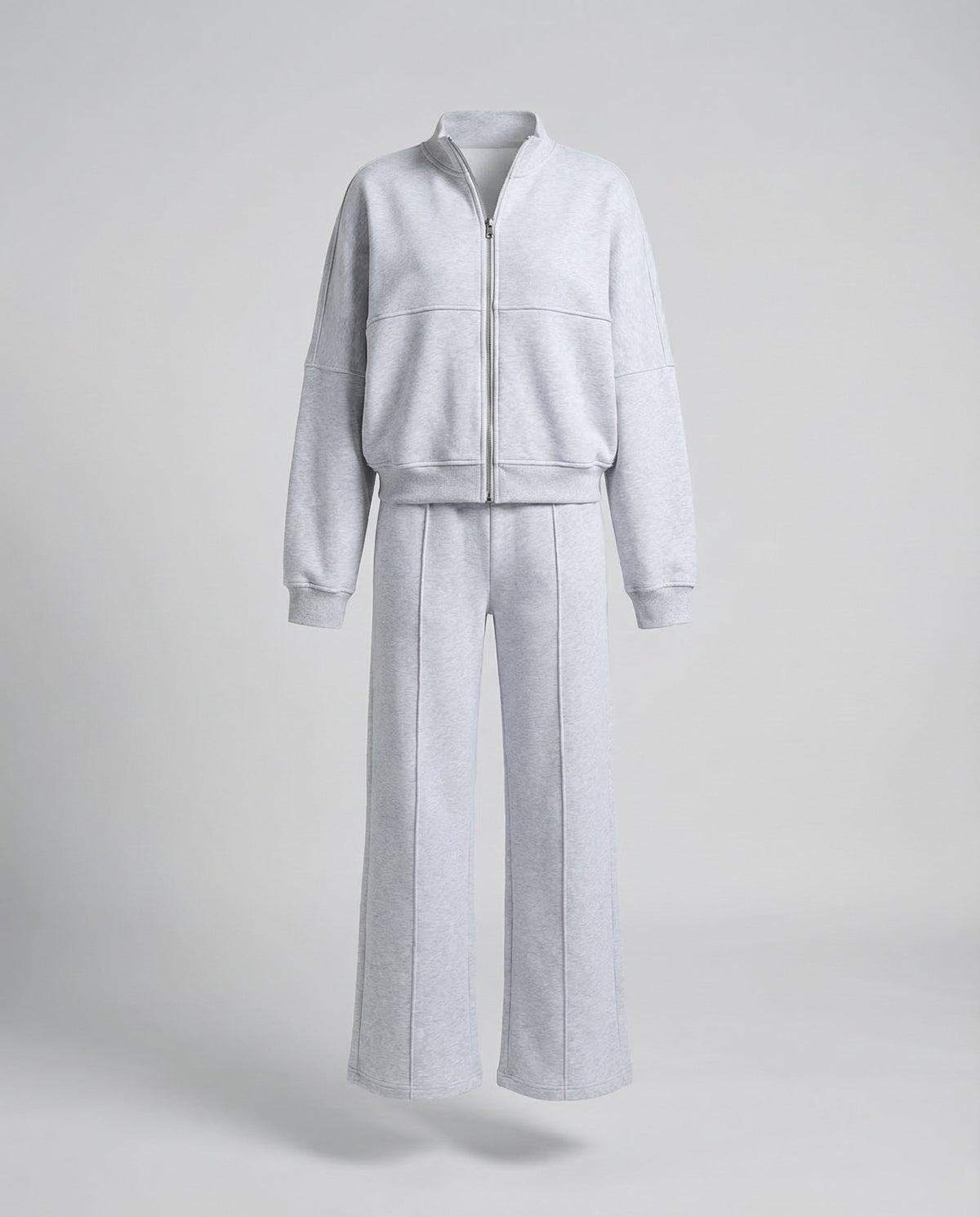 Completo sportivo da donna a due pezzi con giacca corta con zip e pantaloni ampi – Outfit coordinato dal taglio morbido, ideale per viaggi e momenti di relax nel weekend