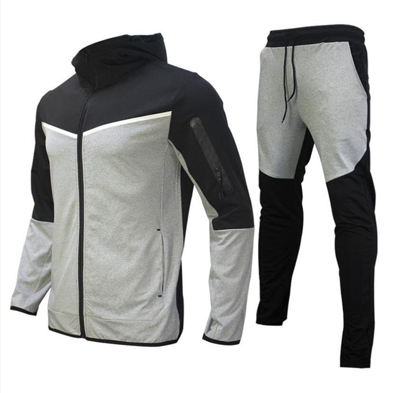 Herren-Performance-Zweiteiler – Kapuzenjacke mit Reißverschluss und schmal zulaufende Jogginghose mit Kordelzug