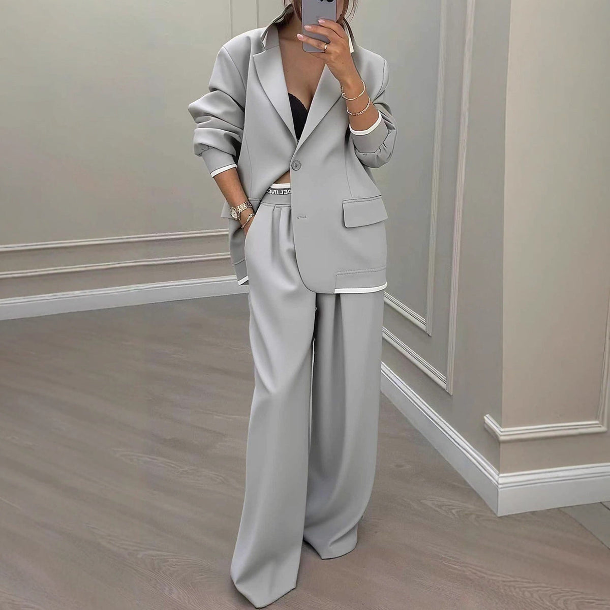 Elegante getailleerde blazer en broekpak voor dames met wijde pijpen - losvallende formele tweedelige outfit voor kantoor en gekleed casual