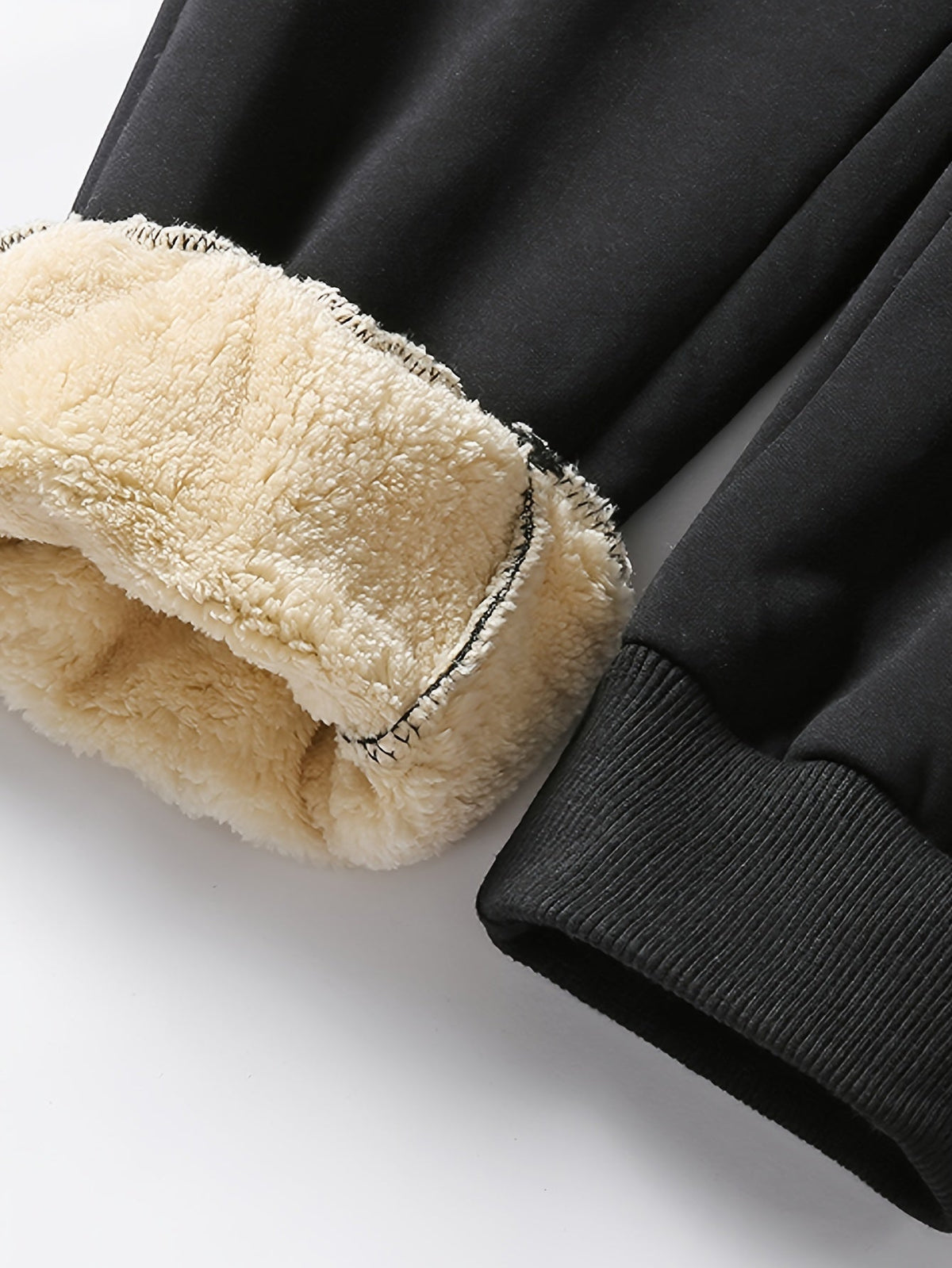 Pánské jogger kalhoty s fleecovou podšívkou – teplé zúžené tepláky s elastickým pasem a náplety u kotníků