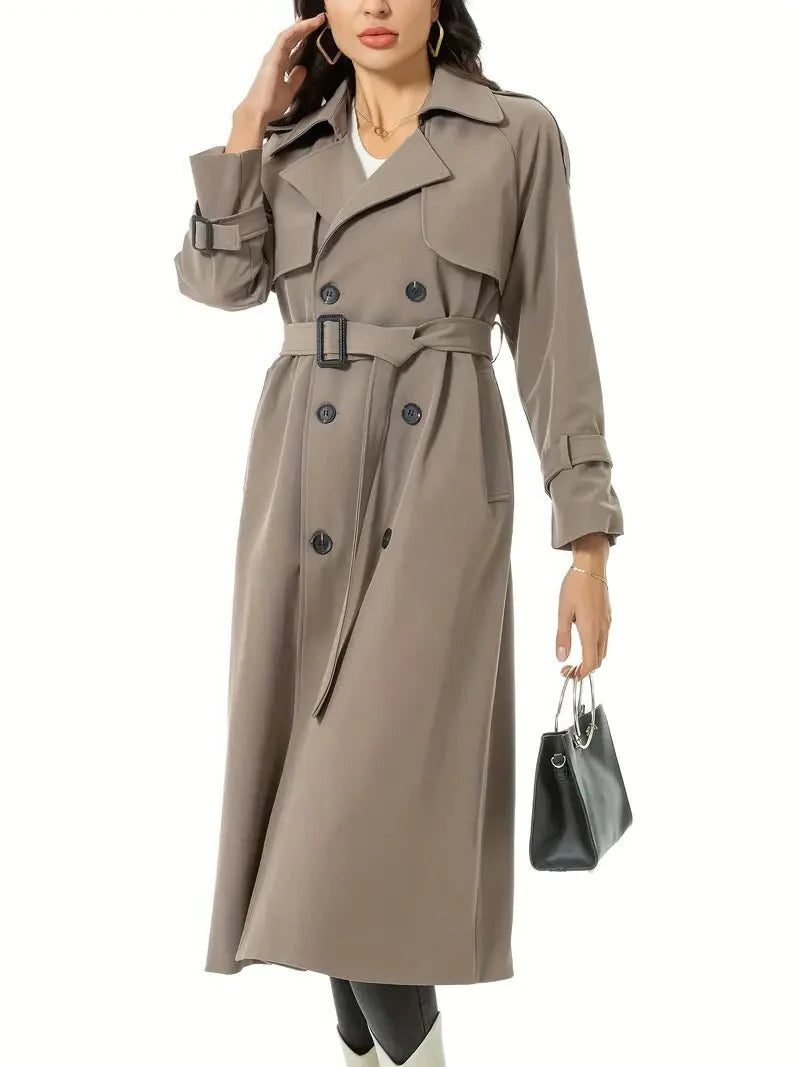 Dames trenchcoat met dubbele rij knopen – lange jas met ceintuur en brede revers voor stijlvolle seizoenslaagjes