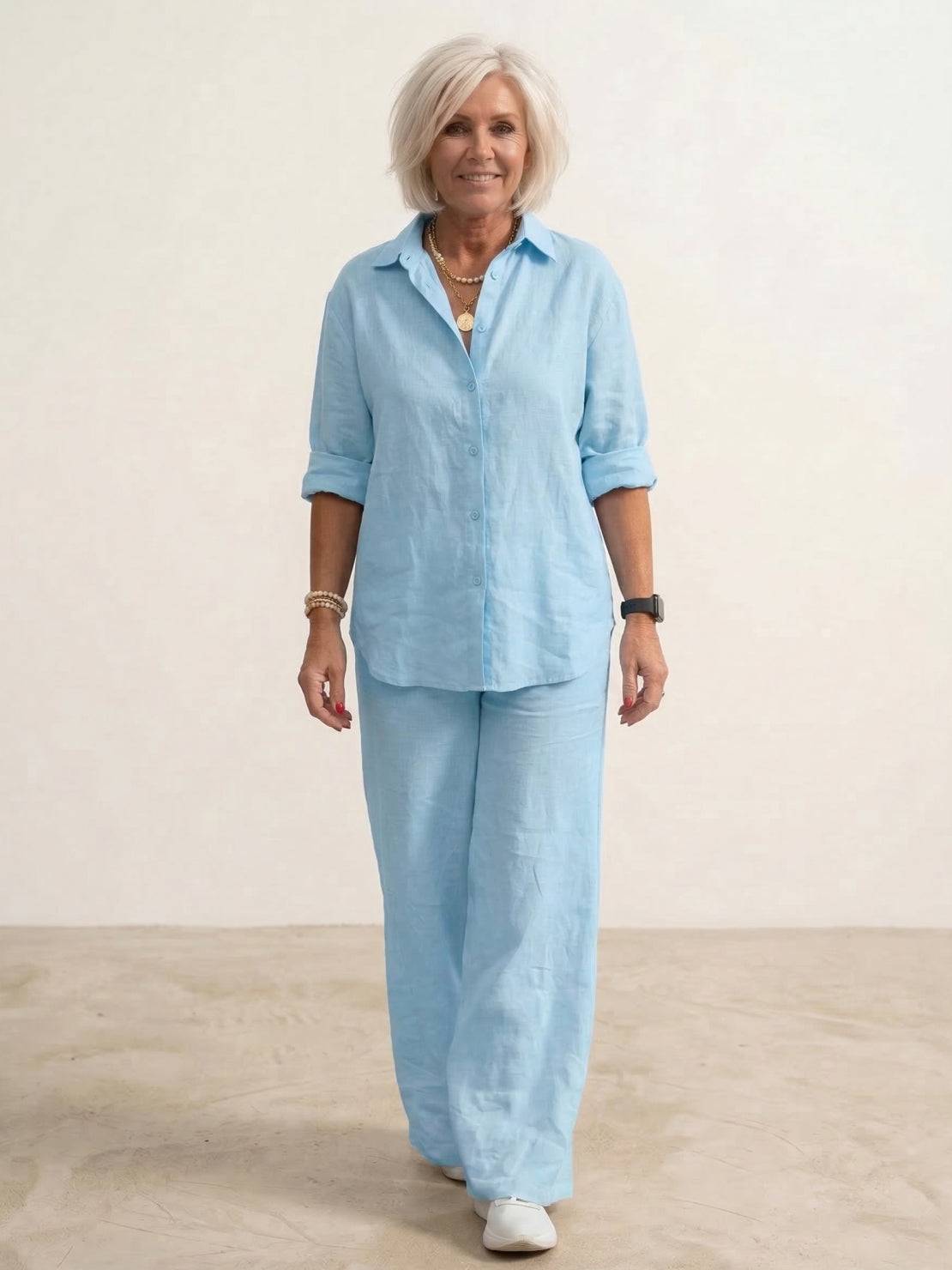 Completo donna con camicia oversize in lino e pantaloni a gamba larga