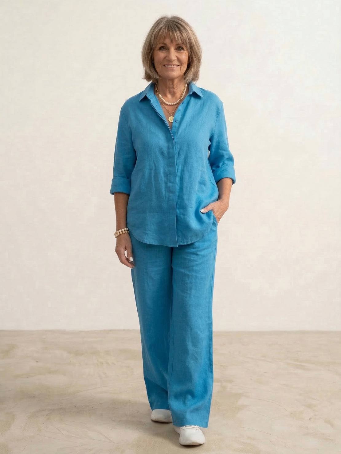 Completo donna con camicia oversize in lino e pantaloni a gamba larga
