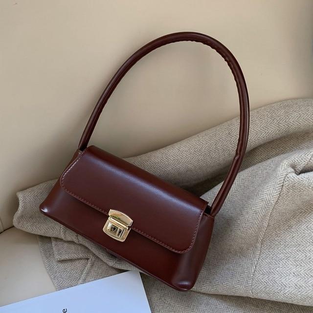 Women’s Small Shoulder Bag with Short Strap and Clasp Detail – Structured Flap Handbag for Everyday Outfits and Evening Plans