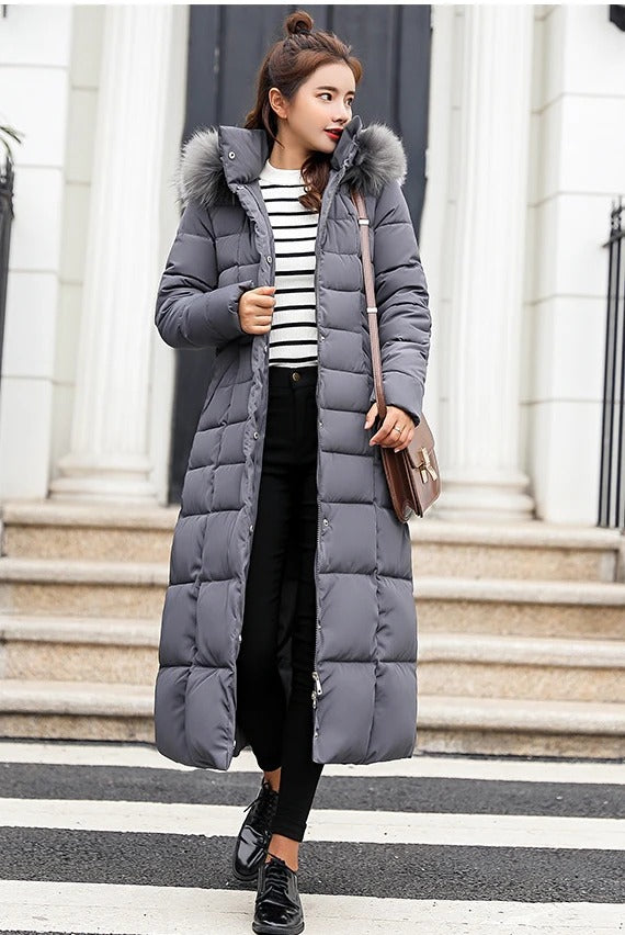 Women’s Fur-Trimmed Long Puffer Winter Coat – Warm Hooded Quilted Layer for Everyday City Wear Winter Travel Outdoor Walks and Elegant Cold-Weather Styling